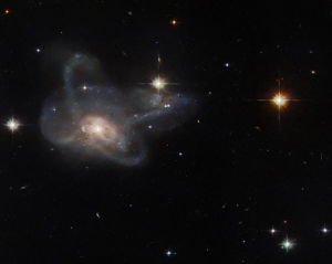 Нет в мире постоянства! Космический объект CGCG 396-2 в созвездии Орион перевернул представление астрофизиков об эволюции звёзд. При внимательном изучен выяснилось, что это необычайно быстро формирующееся плотное скопление галактик, которое к тому же «многоруко» и «умеет петь».  